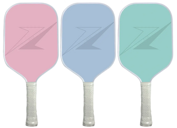 Three colorful pickleball paddles in pink, blue, and green, made from fiberglass and carbon fiber for optimal performance.